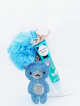 Load image into Gallery viewer, &quot;Bling Teddy&quot; Blue Pom Pom Keychains with Mint Flavored Lipgloss
