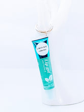 Load image into Gallery viewer, &quot;Bling Teddy&quot; Blue Pom Pom Keychains with Mint Flavored Lipgloss
